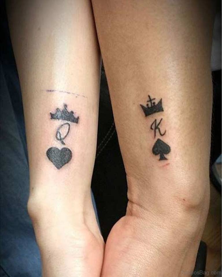 Matching his and her love tattoos