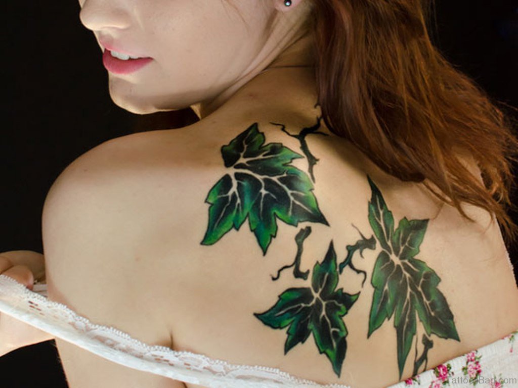 Amazing Green Leaf Tattoo On Upper Back.