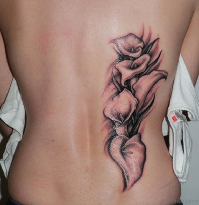 Grey Lily Tattoo On Back.