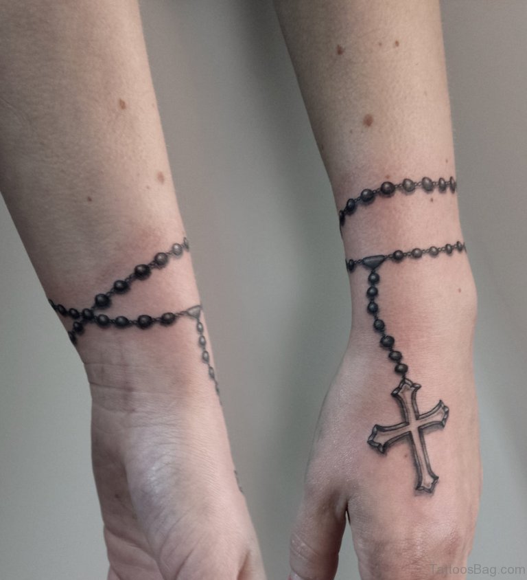Impressive Rosary Tattoo On Wrist.