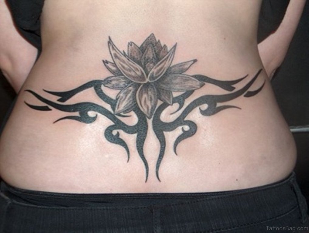 Lotus And Tribal Tattoo.