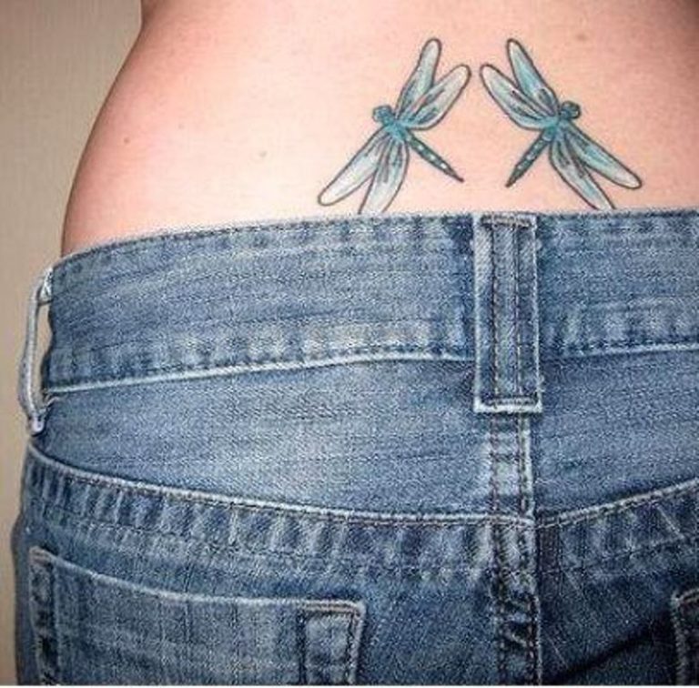 Nice Dragonfly Tattoo On Lower Back.