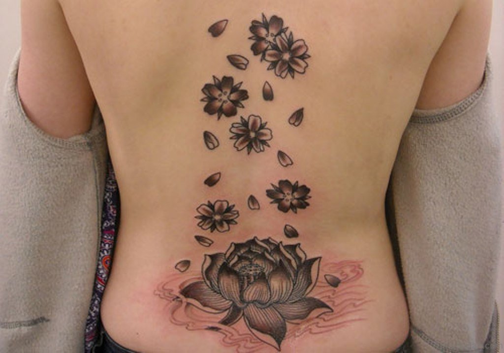 Pink Lotus Flower Tattoo On Upper Back.