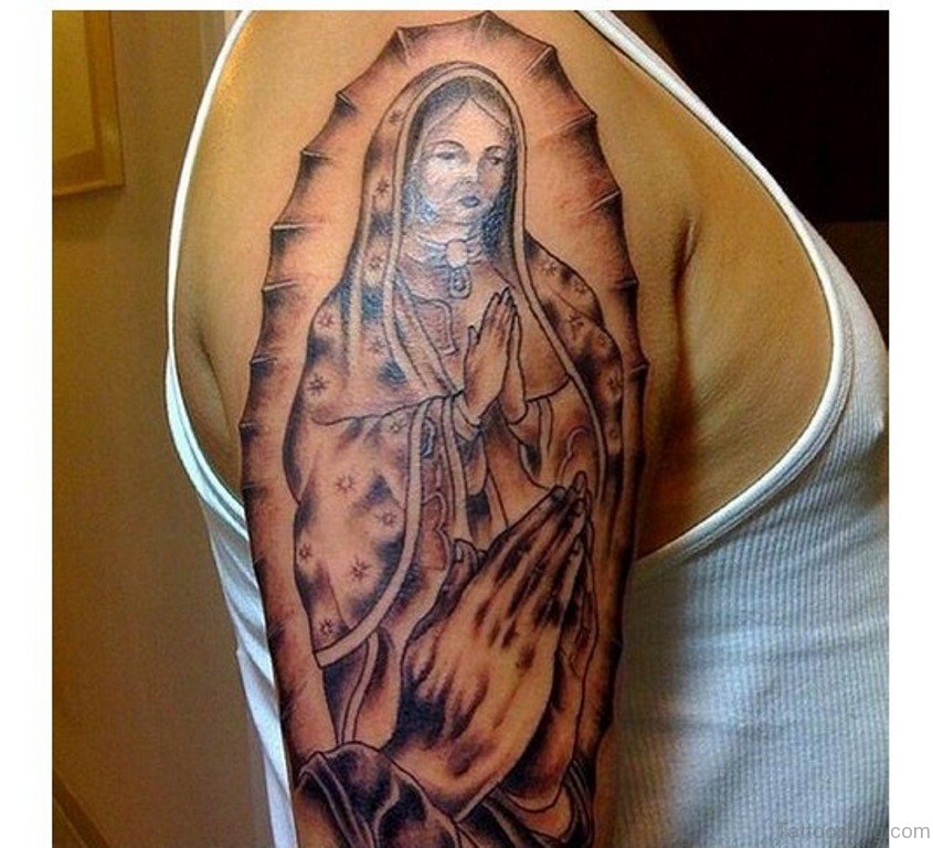 Virgin Mary Tattoo On Right Shoulder.