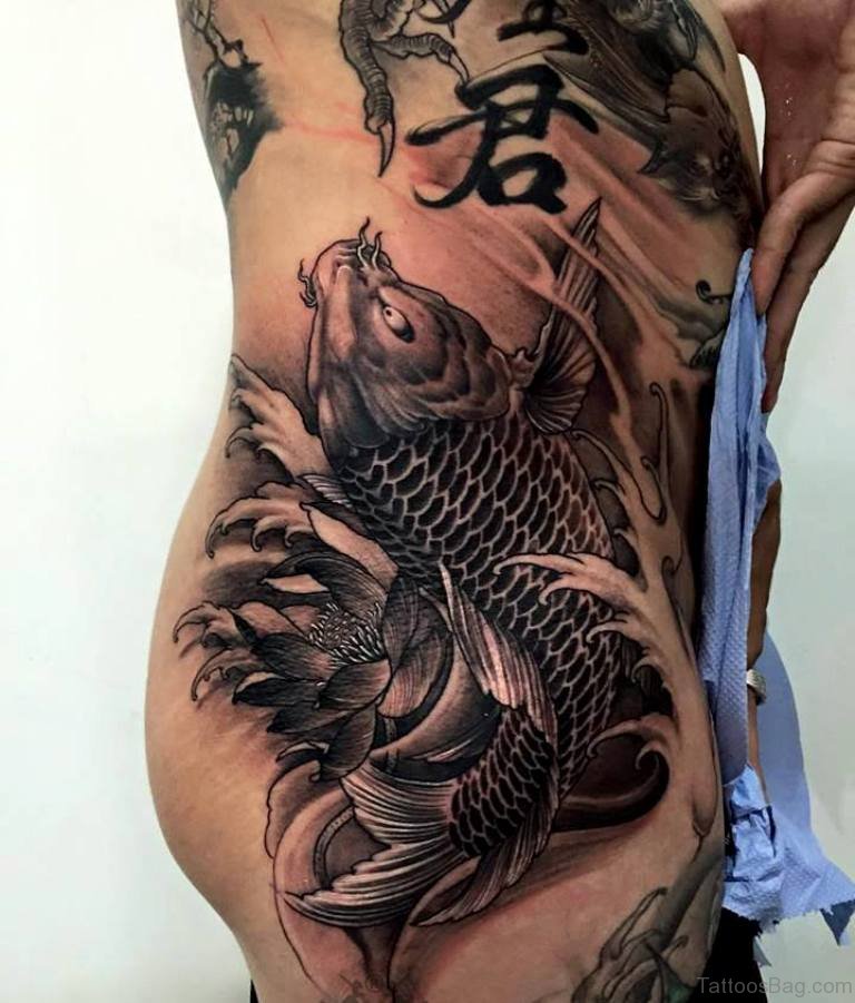 Grey Ink Koi Fish Tattoo On Rib Side.