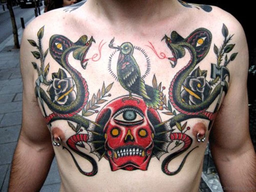 Skull And Snake Tattoo On Chest.
