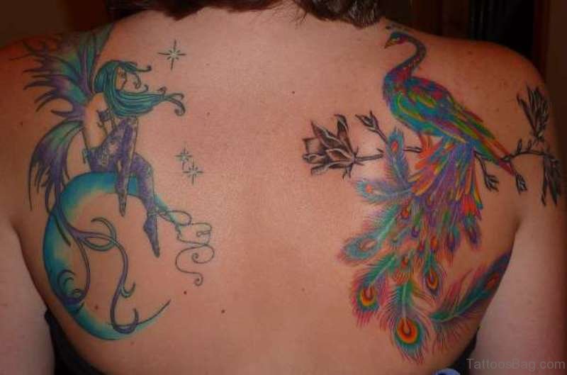 Awesome Peacock Tattoo on Shoulder Blade.