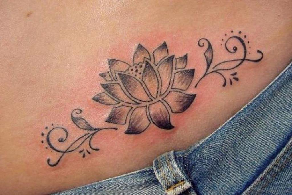 Lotus Flower Tattoo On Waist For Girls.