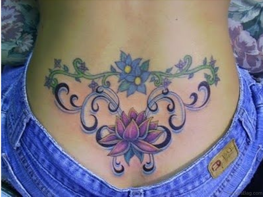 Lower Back Lotus Flower Tattoo Design.