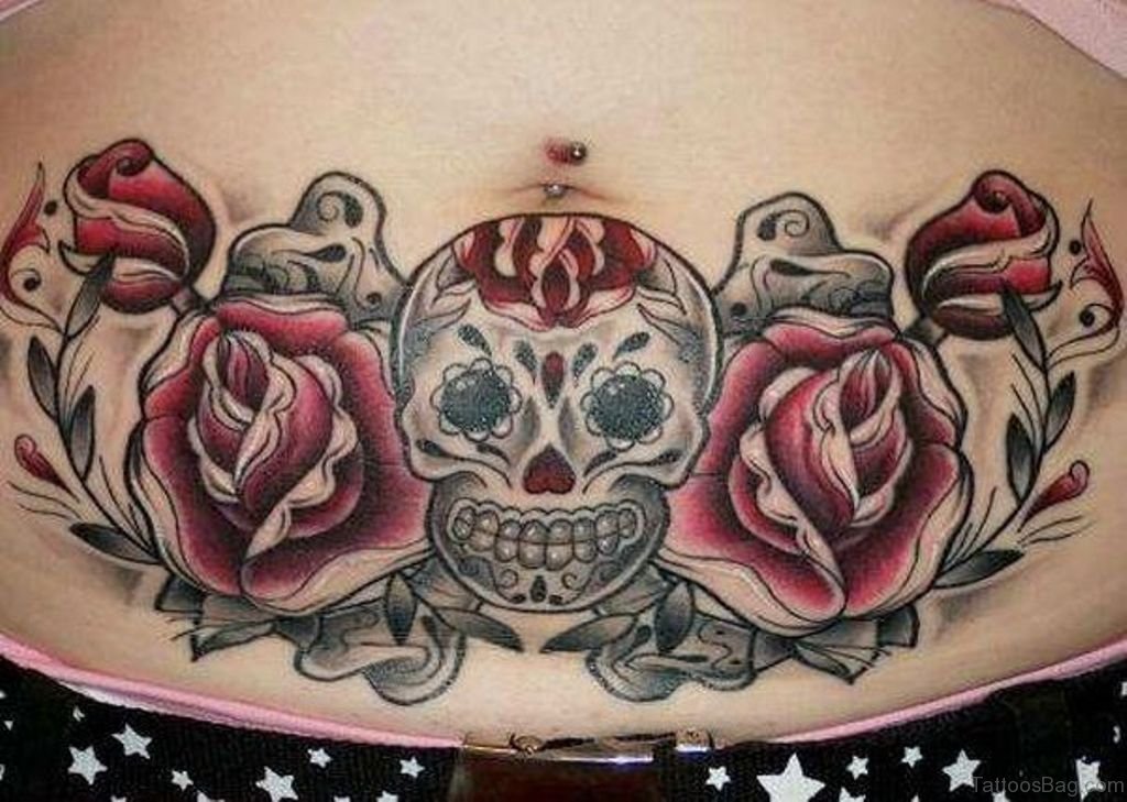 Pink Skull Flowers Lower Back Tattoo.