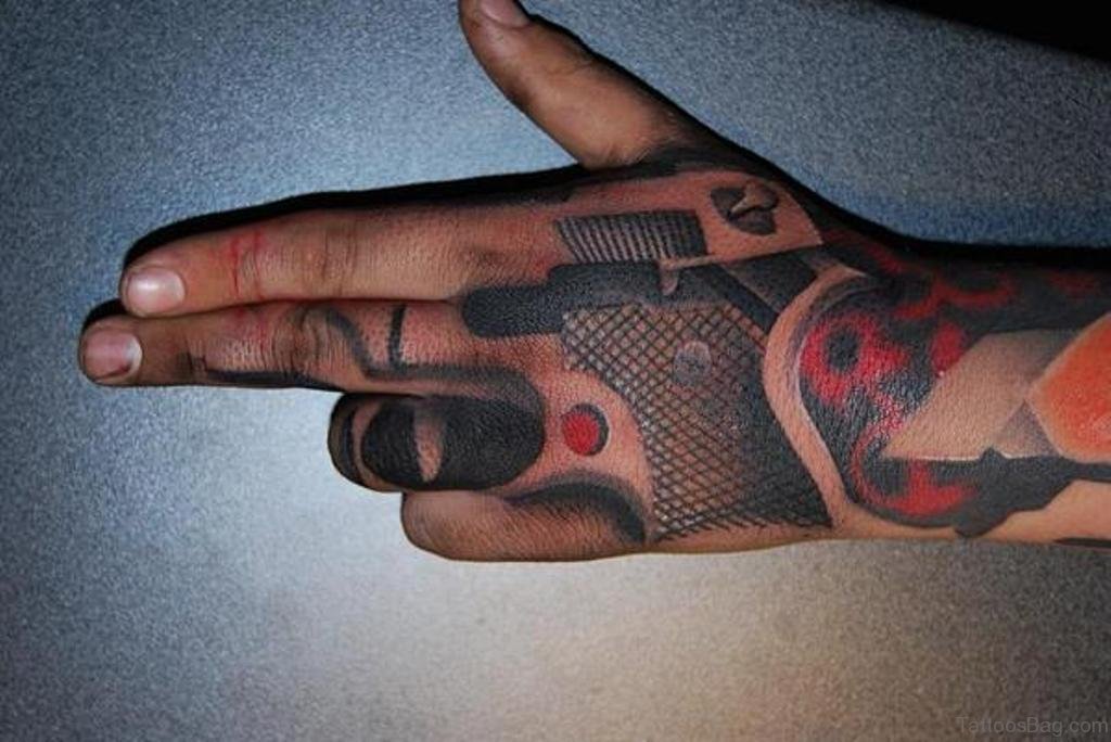 28 Funky Gun Tattoos On Hand - Tattoo Designs – TattoosBag.com