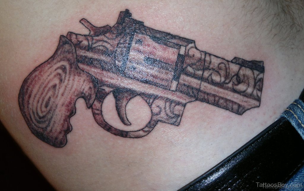 Wonderful Gun Tattoo Design.